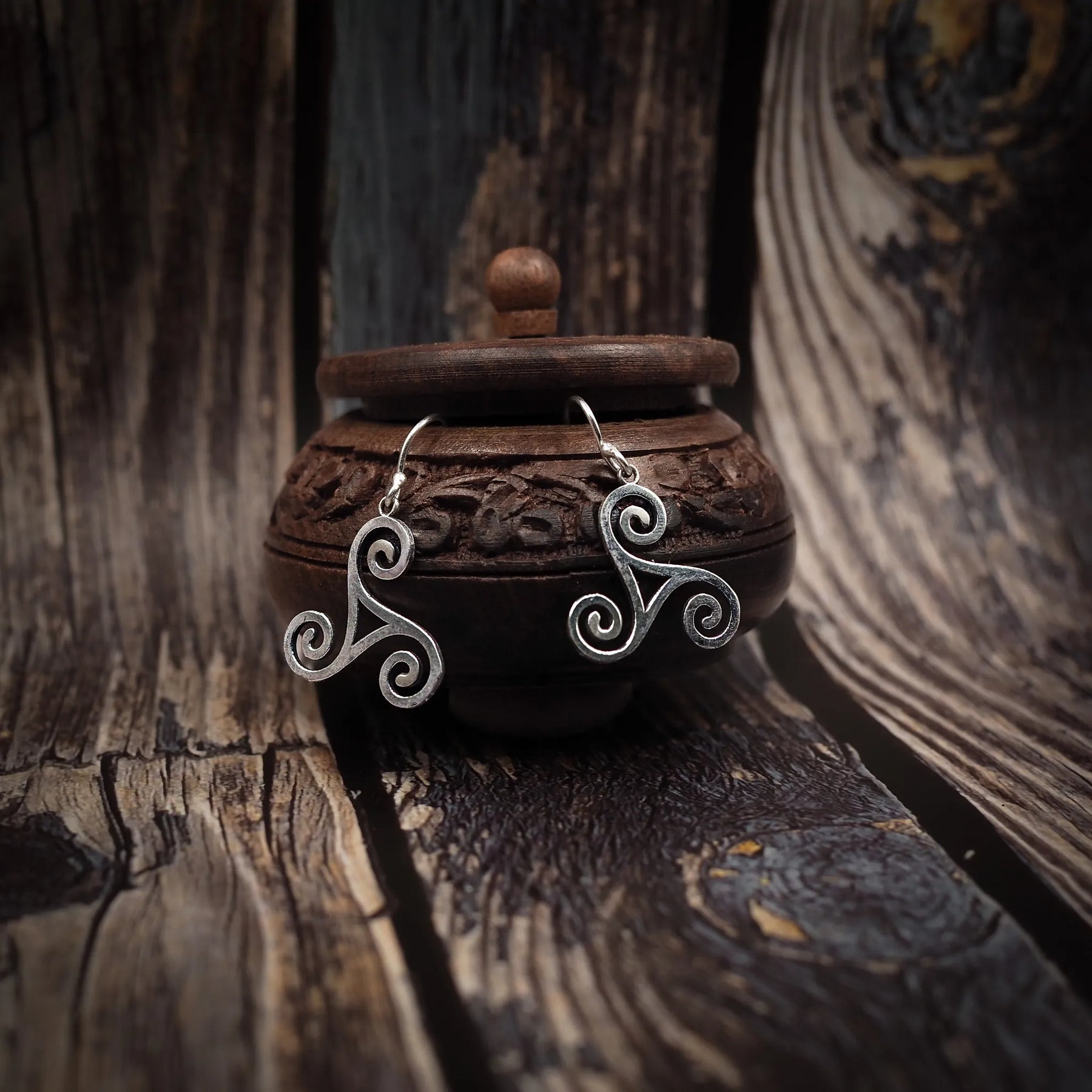 Brass triskele earrings