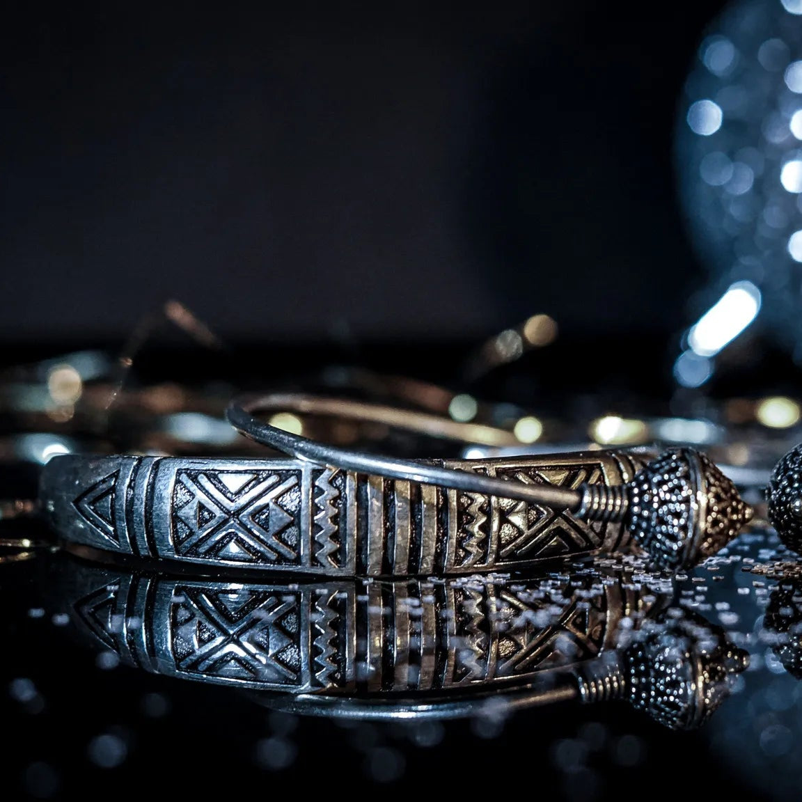 Curved bracelet with decoration
