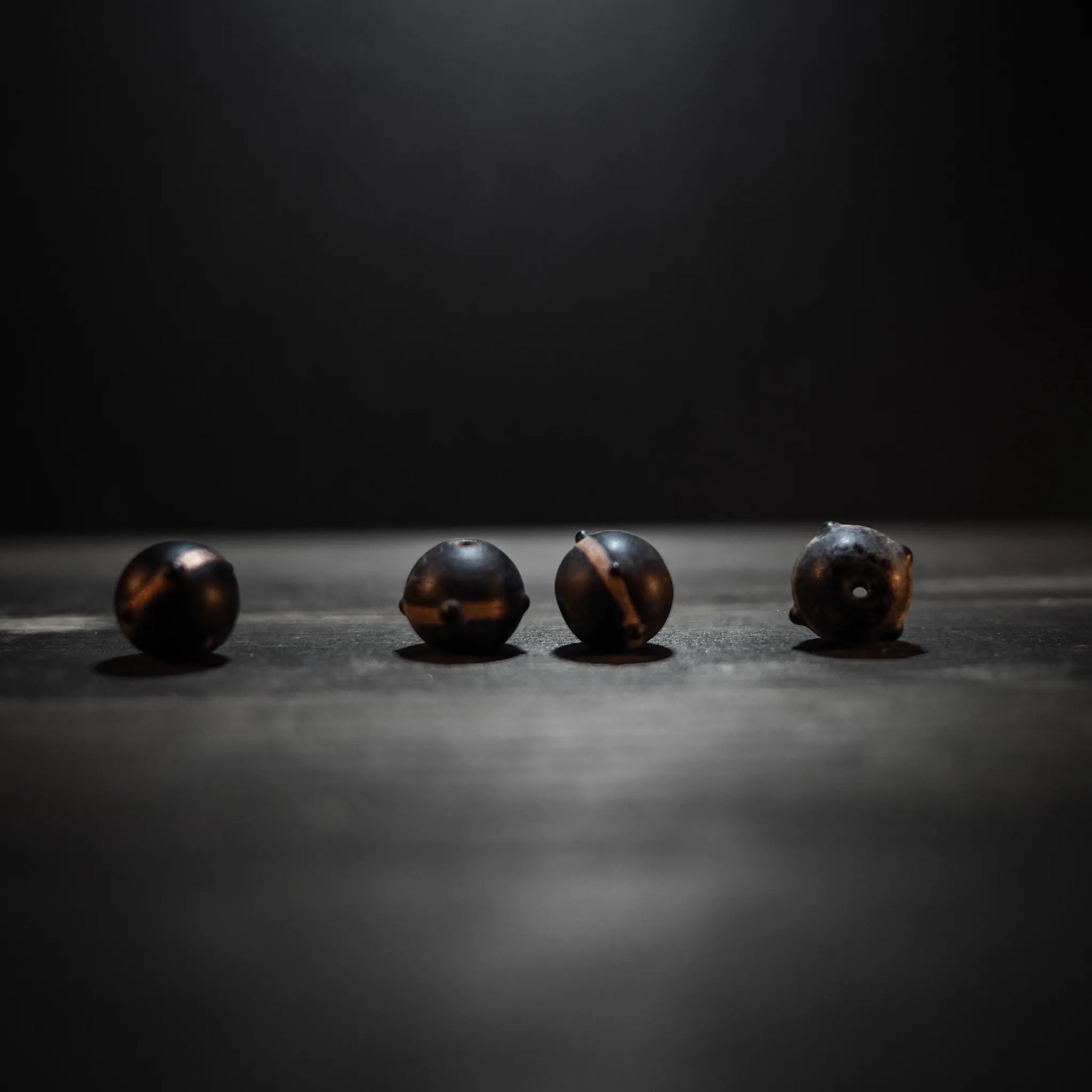Black bead with gold color