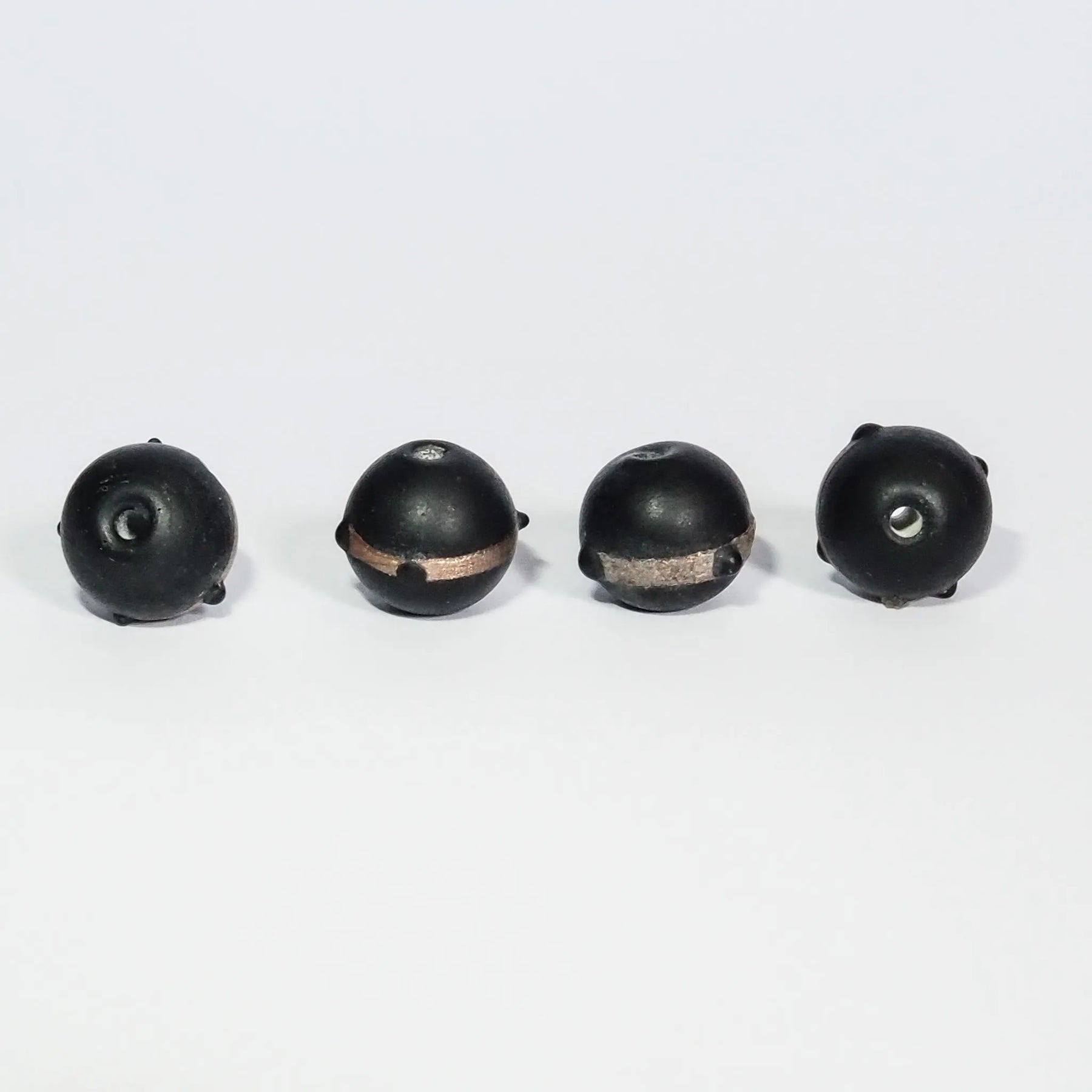 Black bead with gold color