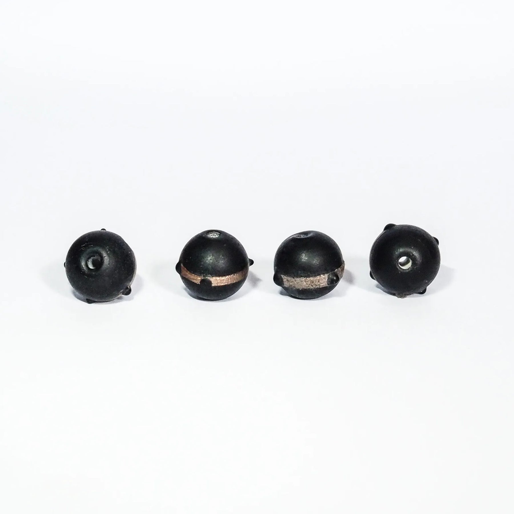 Black bead with gold color