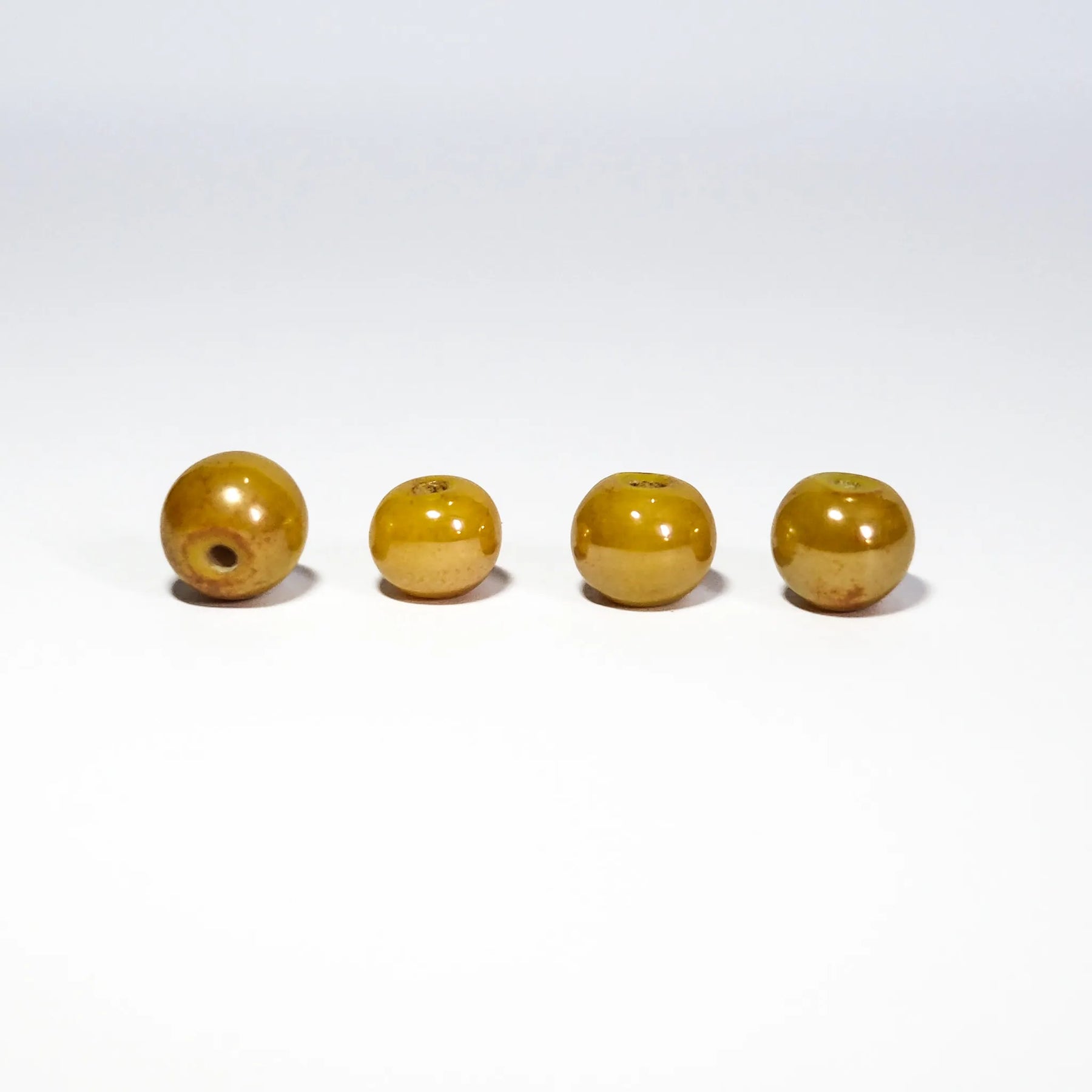 Round yellow glass bead