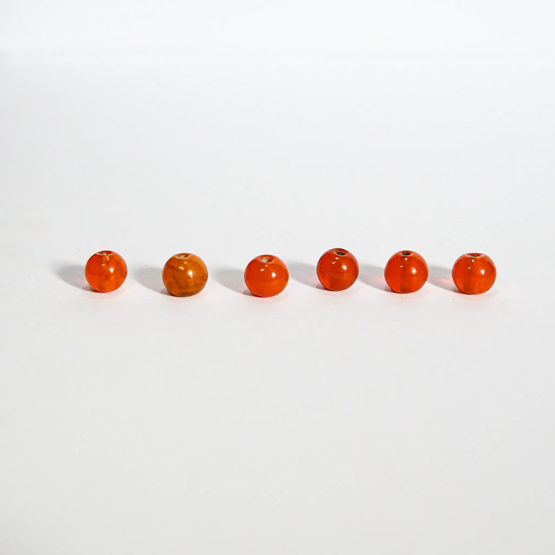 Round orange bead