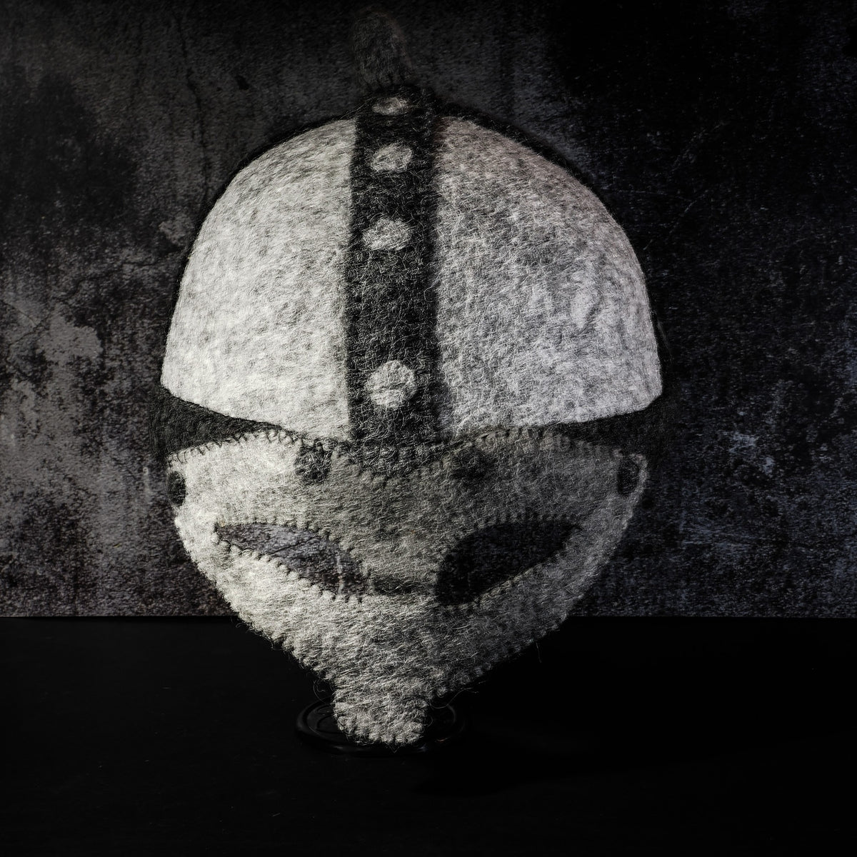 Felted wool Viking helmet for children — dome shape with light gray wool and dark gray center stripe