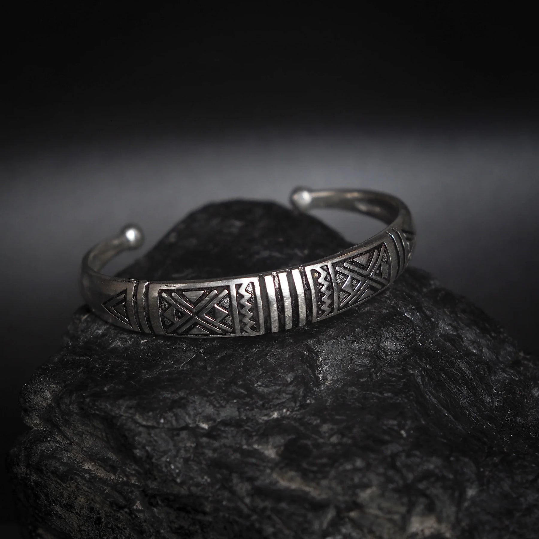 Curved bracelet with decoration