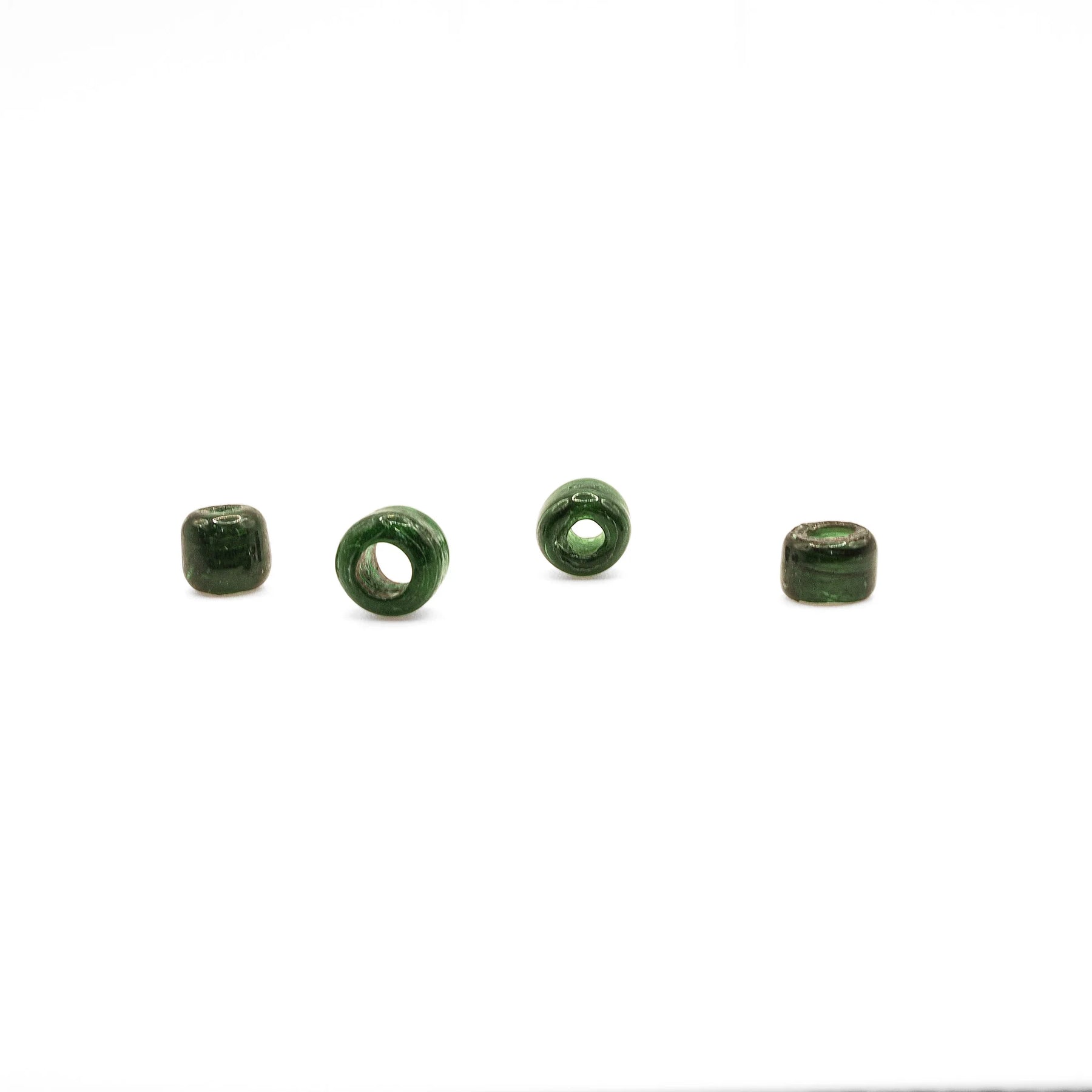 Flask green glass bead with a large hole