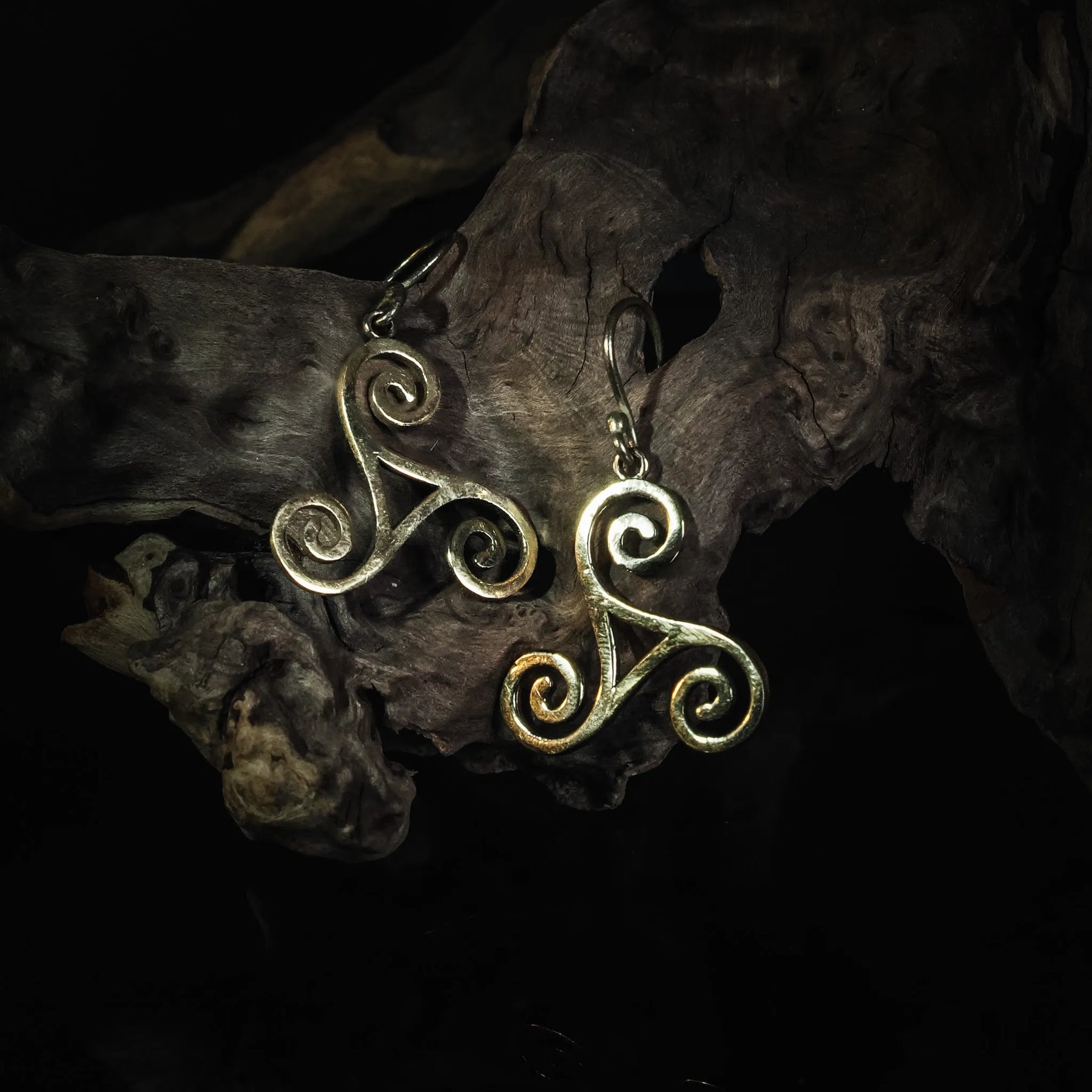 Brass triskele earrings