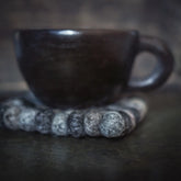 Tovat underlägg till muggar och glas