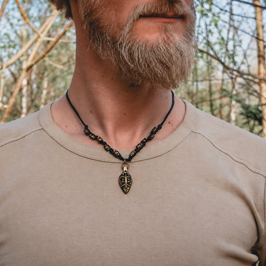 Odin necklace – on a model, the god mask clearly visible at the neck
