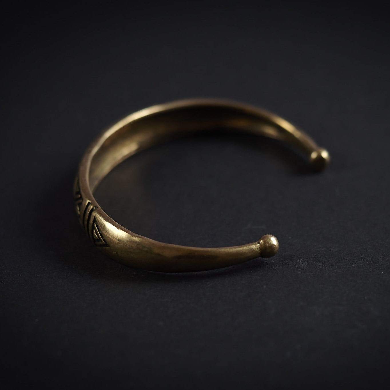 Curved bracelet with decoration