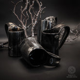 Set med fyra espressomuggar