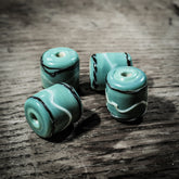 Green glass bead, Gotland – green-turquoise with pattern in black and white
