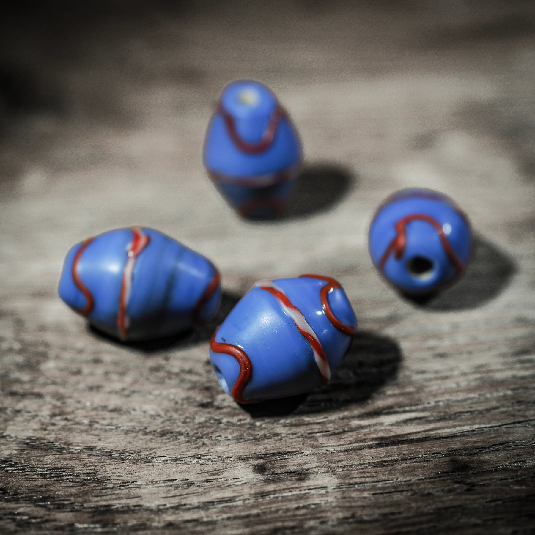 Blue elongated glass bead with red and white decor – 20x16 mm, replica of a find in Ribe