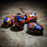 Mottled mosaic bead, Kiev – red and blue with spirals and checkered pattern