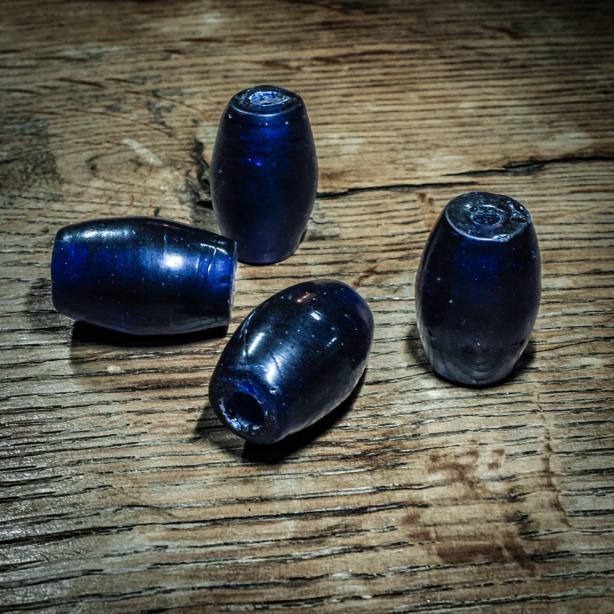 Deep blue bead in transparent glass, matte. Gotland