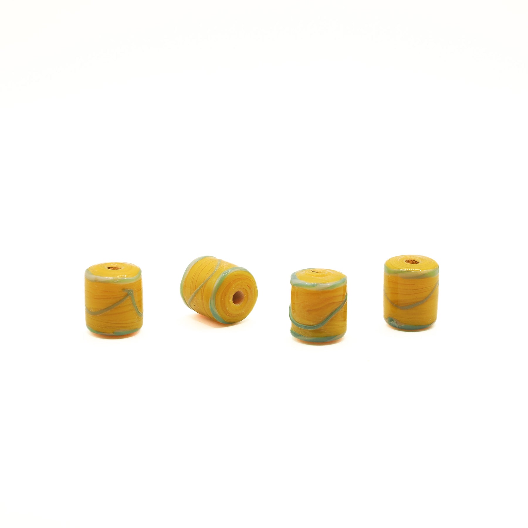 Yellow bead with blue decoration, Helgö