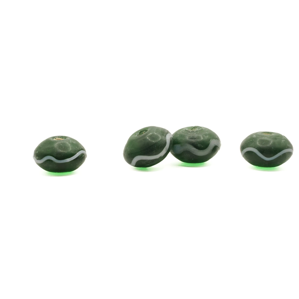 Green glass bead Birka – four beads in a row from the side, flat round shape with white wave decoration around the edge