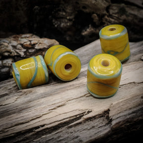 Yellow bead with blue decoration, Helgö