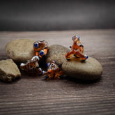 Orange pärla med ögon