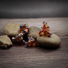 Orange pärla med ögon