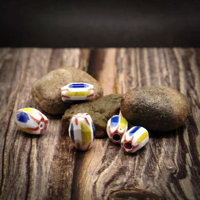 Oval flerfärgad glaspärla