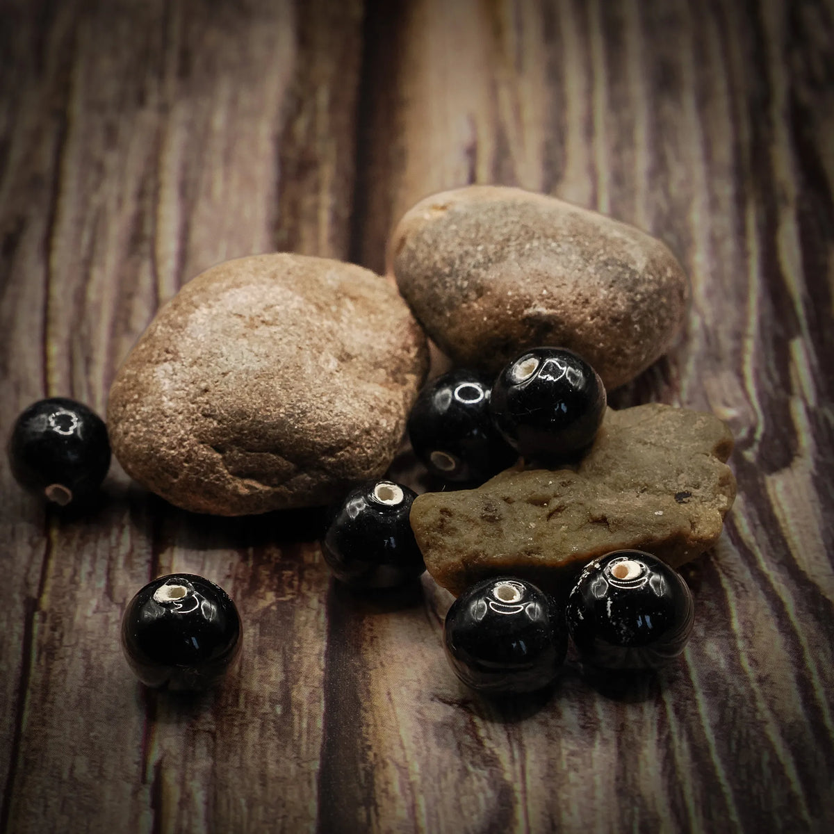 Svart rund glaspärla