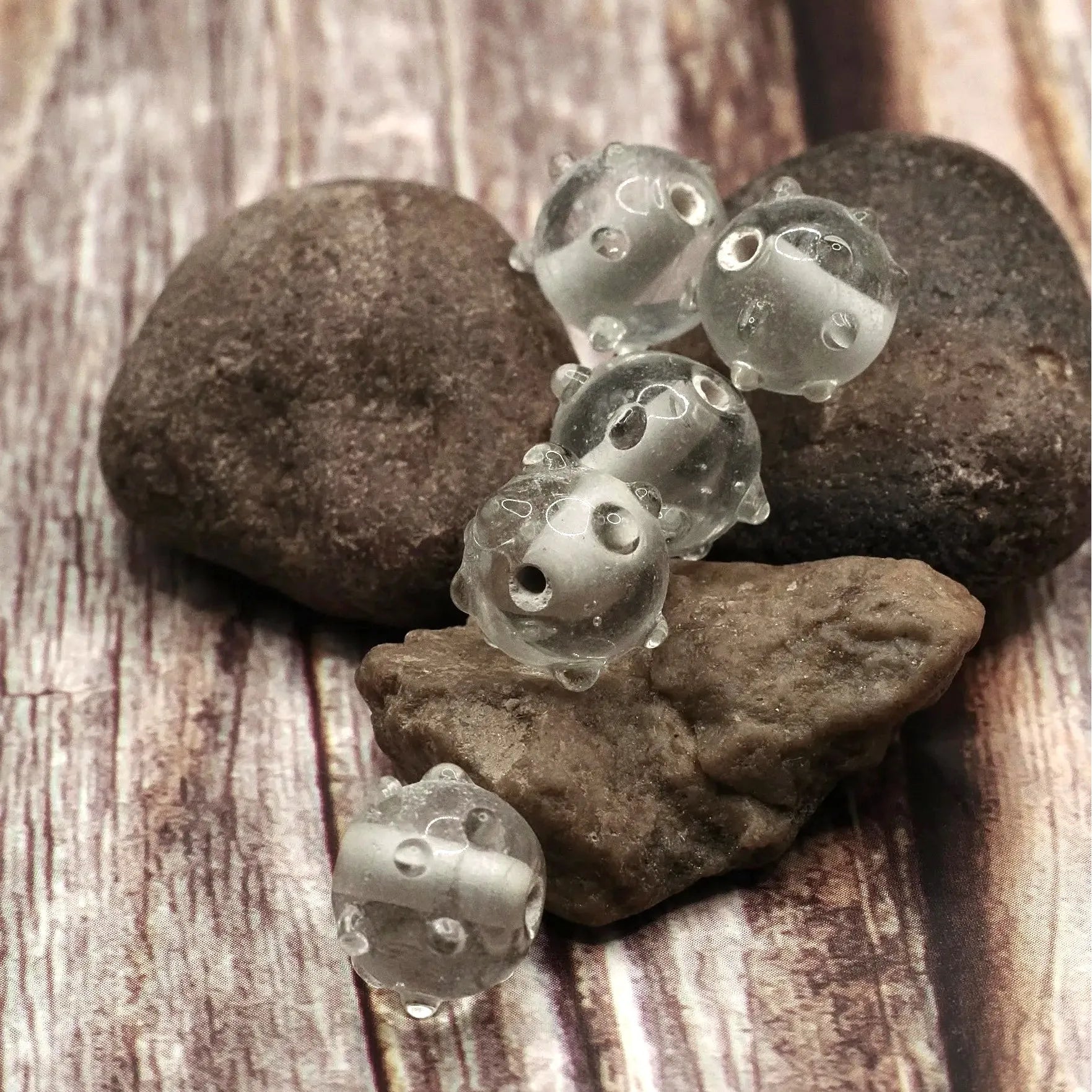 Transparent glass bead with dots