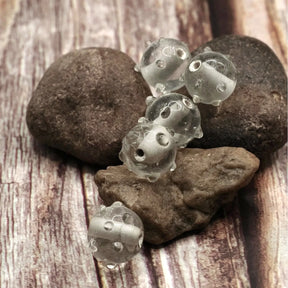 Transparent glass bead with dots