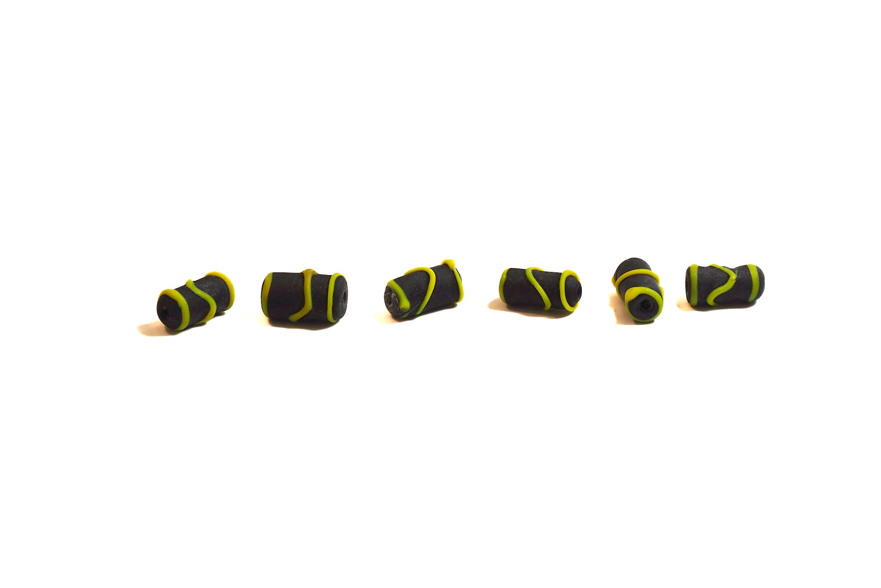 Glass bead, black with yellow decor, matt