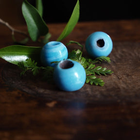 Light blue round glass bead