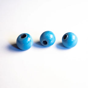 Light blue round glass bead