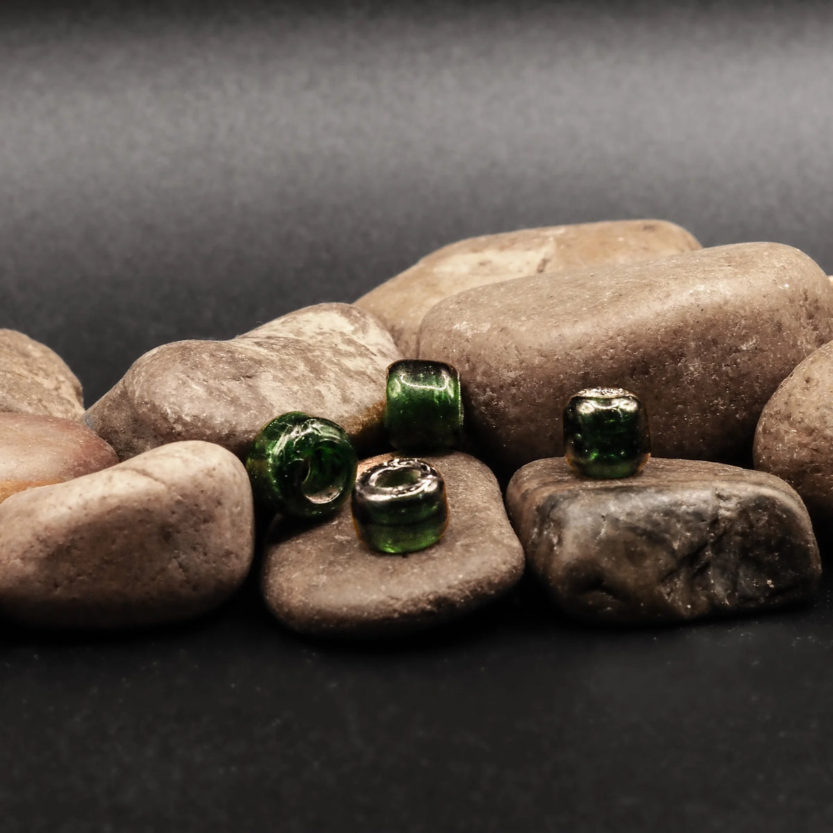 Flask green glass bead with a large hole