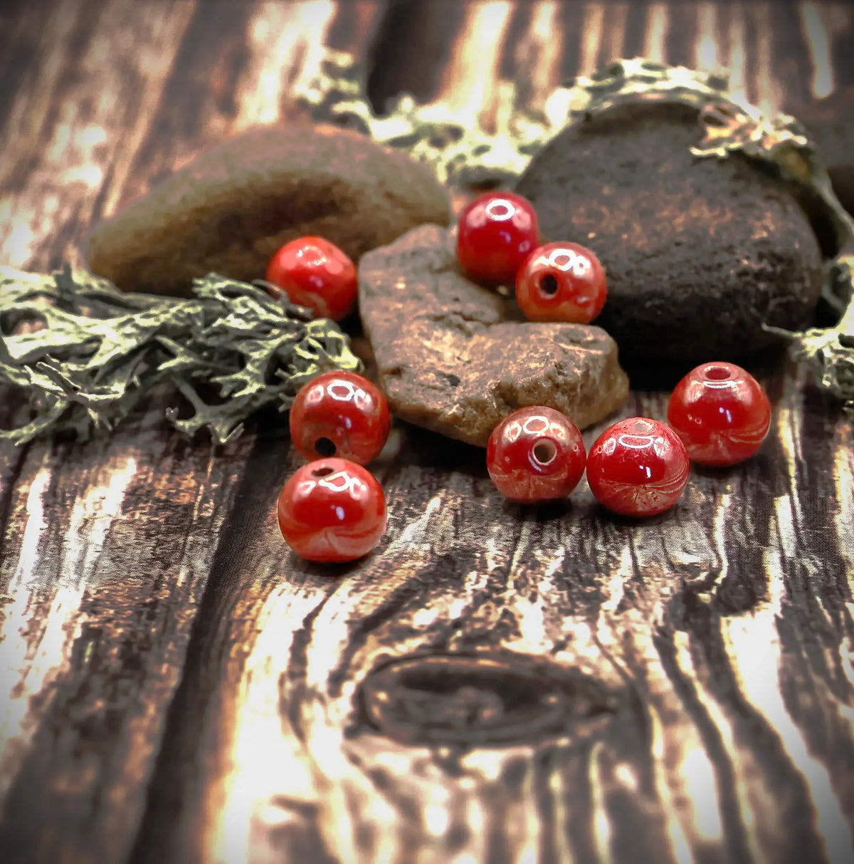 Rödorange glaspärla