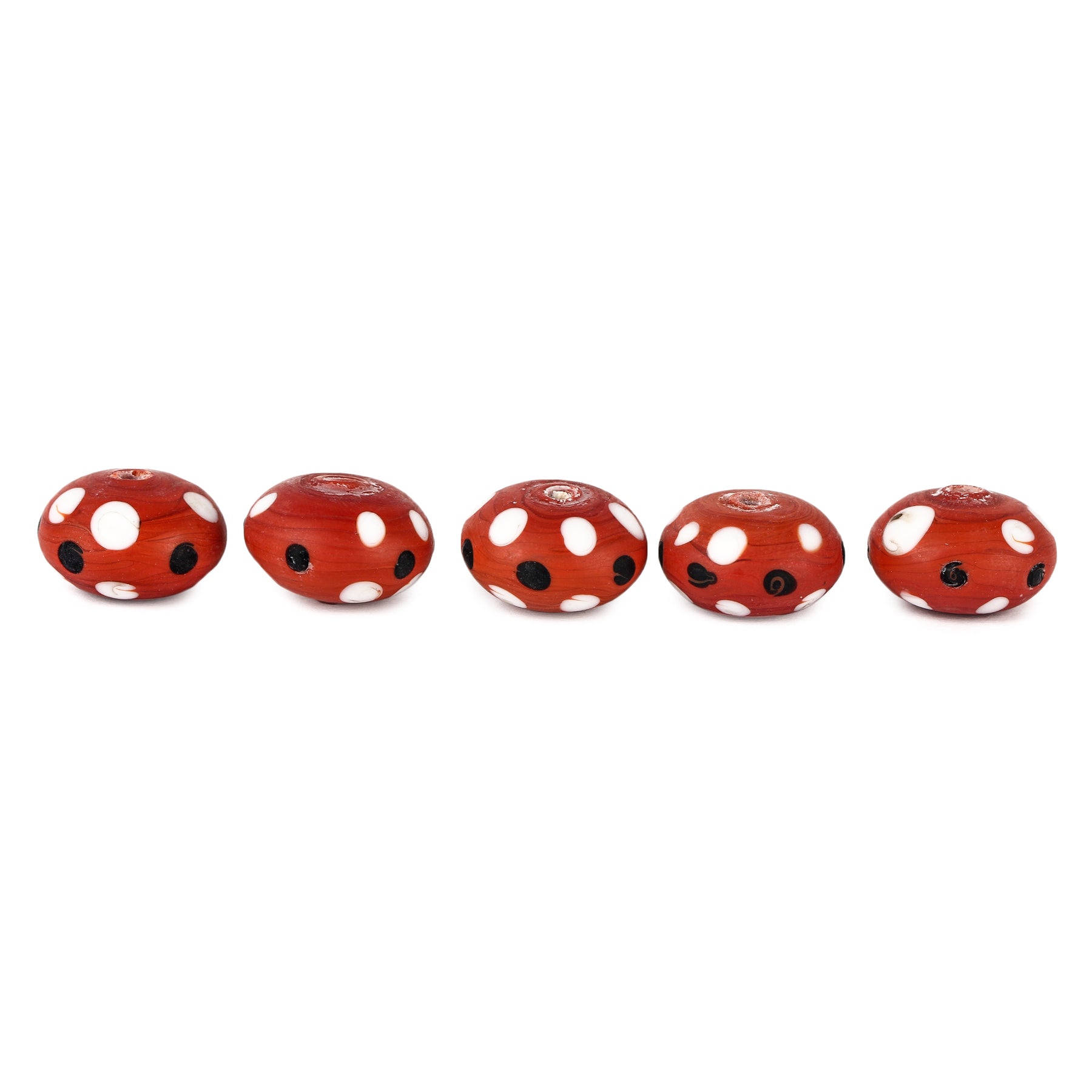 Red glass bead with dots