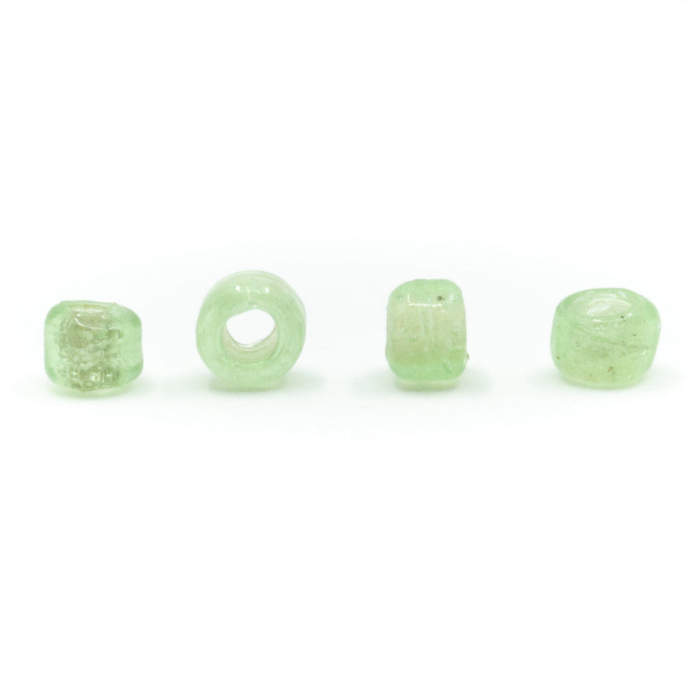 Light green glass bead, cubic, Gotland – four beads, the cube shape clearly visible