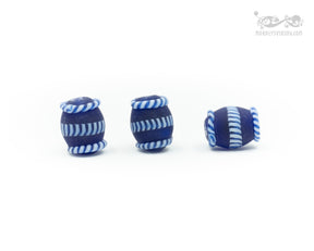 Blue glass bead with decoration, matt