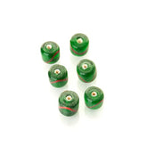 Green glass bead with decoration
